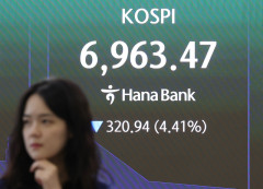 住宅ローンも株も抱えた家計に高金利の請求書、利上げ再開で韓国の投資家から悲鳴